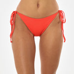 Red bikini bottom on a white background